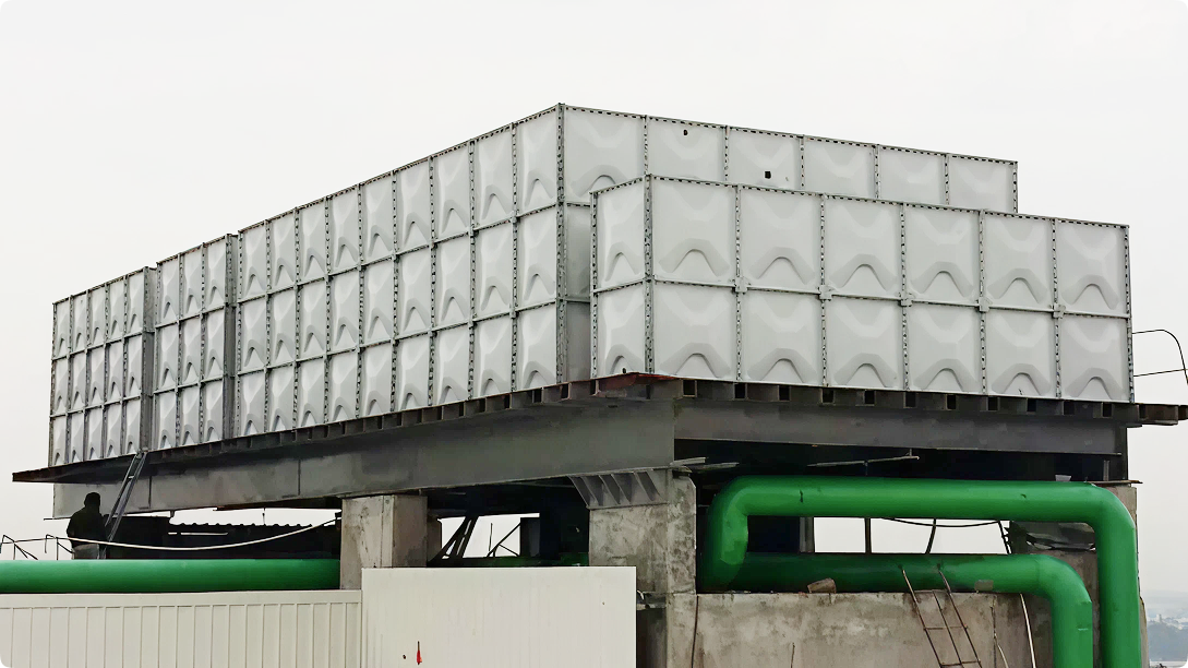 Overhead water tank equipped with IoT sensor for automated water level tracking and control. Overhead water tank equipped with IoT sensor for automated water level tracking and control.
